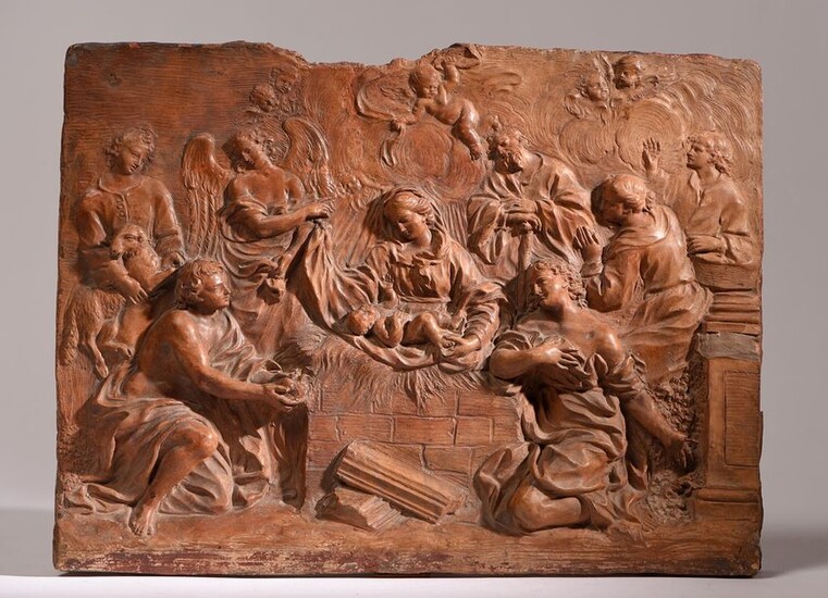 The Terracotta Nativity carved in high relief representing the Virgin assisted by angels and shepherds, Follower of Bernini, Late 17th-early 18th century. Work to be compared with the work of the Roman artist Bartolomeo MAZZUOLI (1674-1748) 28.5 x 37...