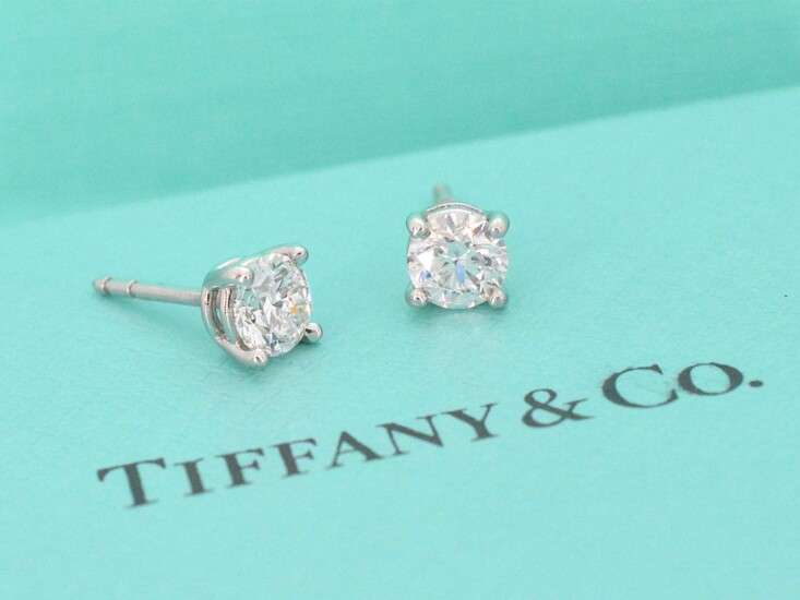 Tiffany & co. "Solitaire earrings with 1.20 carat"