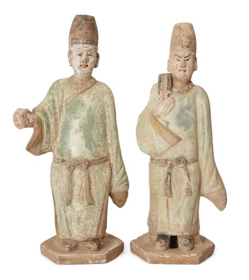 Two Chinese green-glazed pottery tomb attendant figures, Ming Dynasty, the tallest 33cm high (2). 明 陶綠釉人像兩尊