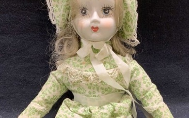Vintage porcelain Doll w Green Floral Dress