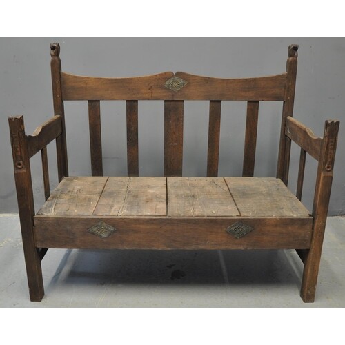 West African stained hardwood slat backed settle, the open a...