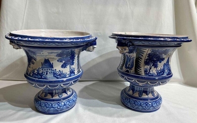 1 Pair of Nevers earthenware cachepot, signed Henri....
