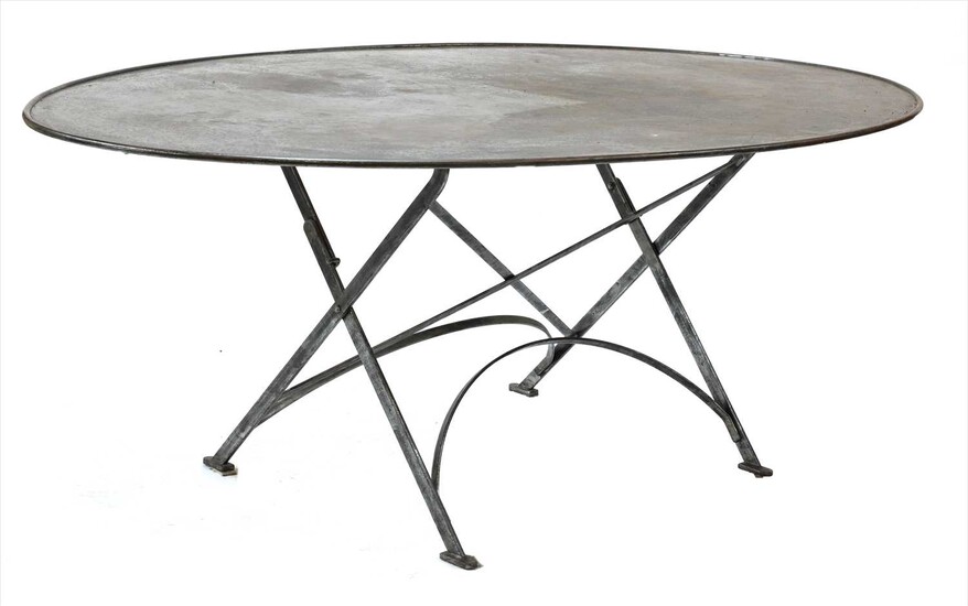 A large French oval steel dining table