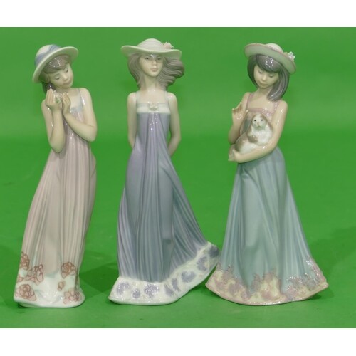 3 x Lladro Figures of ladies wearing hats, tallest 20.5cm hi...