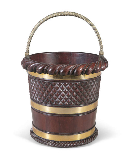 A MAHOGANY AND BRASS BOUND BUCKET, c.1830, with...