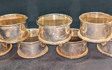 7 Vintage Leonard Silver Plated Napkin Rings