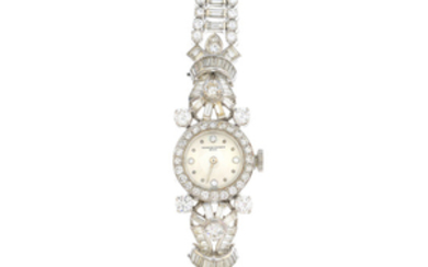 VACHERON CONSTANTIN - a lady's mid 20th century platinum diamond cocktail watch.