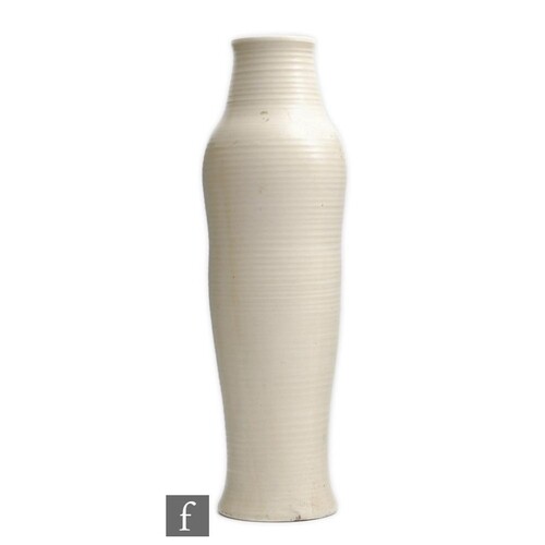 A 1930s William Moorcroft vase of shaped elongated form...