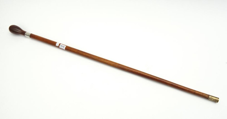 A 19TH CENTURY AUSTRALIAN BLACKWOOD SHAFTED WALKING STICK WITH SILVER BAND AND BALL TOP