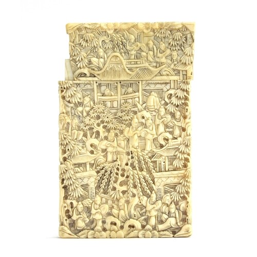 A 19th century Chinese ivory card case, profusely carved wit...