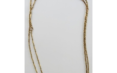 A 9ct gold long guard chain 140cm long, 34.9gms. All weights...