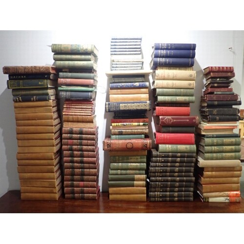 A COLLECTION OF BOOKS largely containing works of fiction or...