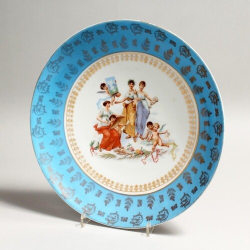 A CONTINENTAL PORCELAIN DISH, the centre decorated with fema...