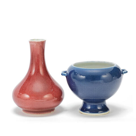 A COPPER-RED-GLAZED VASE AND A BLUE-GLAZED FOOTED JAR