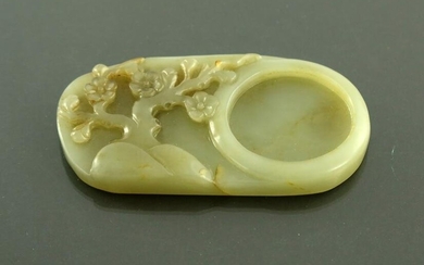 A Chinese carved jade scholar's palette