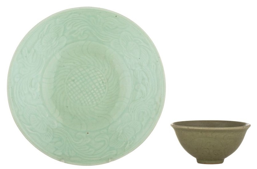 A Chinese celadon-glazed porcelain plate, impressed with floral...