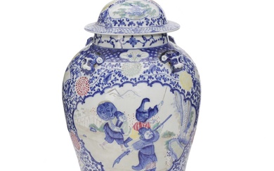 A Chinese 'figural' baluster jar and cover, with four relief moulded foo-dog...