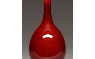 A Chinese flambe glazed vase, 20th c, of slender bulbous for...
