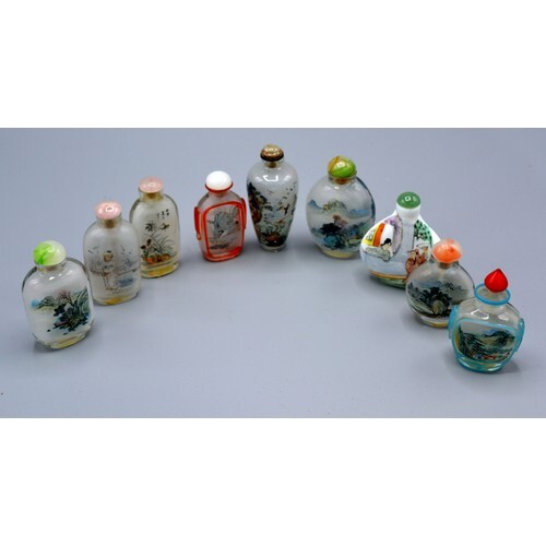 A Collection of Eight Chinese Glass Scent Bottles together w...
