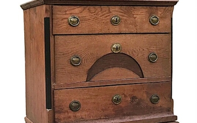 A Danish late Empire oak wood chest of drawers. Ca. 1840. H. 86 cm. W. 86 cm. D. 52 cm.