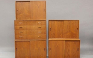 A Danish teak wall system in the manner of Poul Cadovius, c.1960, comprising four units with sliding doors, one unit with four drawers and two wall mounts, three units: 50cm high, 80cm wide, 40cm deep, two units