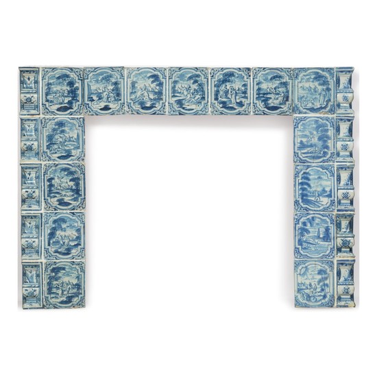 A FIRE SURROUND FORMED OF 18TH CENTURY GERMAN FAIENCE STOVE TILES