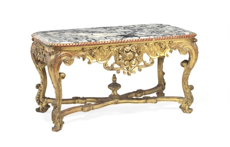 A French Louis XIV style giltwood center table with curved marble top. Late 19th century. H. 79 cm. L. 150 cm. W. 85 cm.