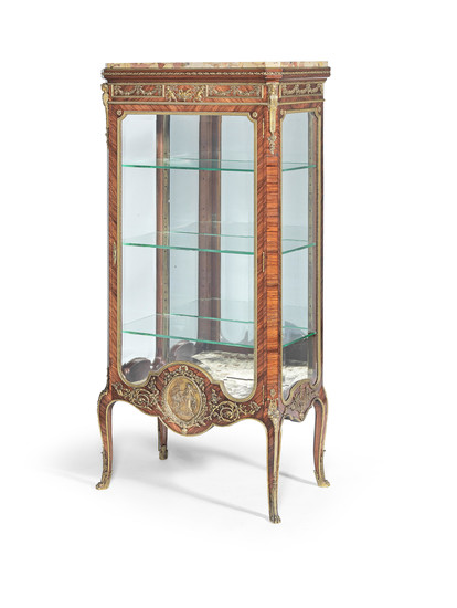 A French late 19th/early 20th century gilt bronze mounted kingwood vitrine attributed to Francois Linke (1855-1946)