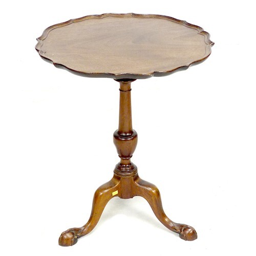 A George III mahogany occasional table, the fixed dished pie...