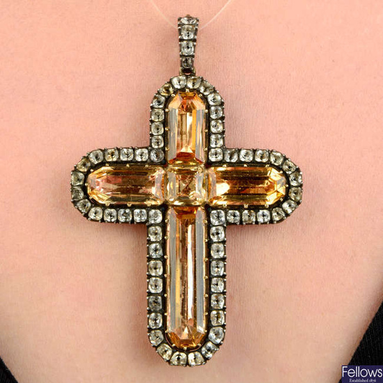 A Georgian silver and 15ct gold foil back topaz and 'black dot' colourless paste cross pendant.