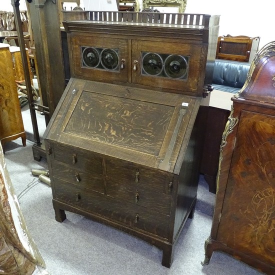 A Liberty Arts and Crafts oak bureau bookcase, possibly Cull...