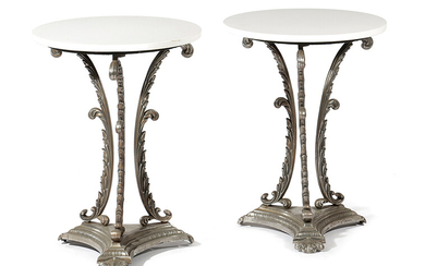 A PAIR OF CAST IRON OCCASIONAL TABLES