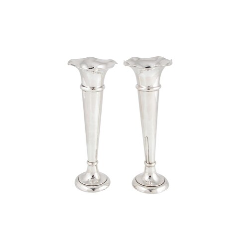 A PAIR OF GEORGE V SILVER TRUMPET VASES, with wavy rims of w...