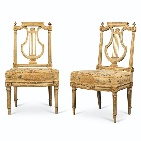 A PAIR OF LOUIS XVI GREY-PAINTED AND PARCEL-GILT SIDE CHAIRS