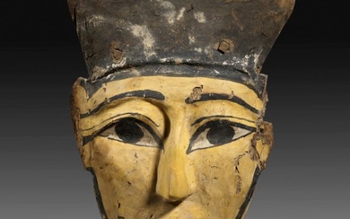 A Ptolemaic wooden mask of a mummy.