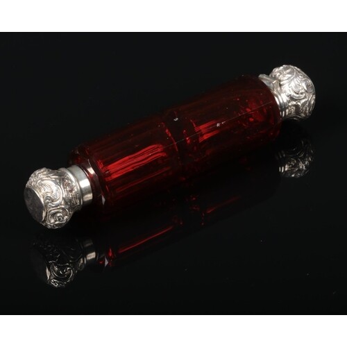 A Victorian flat cut ruby glass double scent bottle with sil...