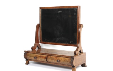 A Victorian mahogany dressing table mirror. With rectangular frame, above two moulded drawers with turned handles, flanked by acanthus brackets, on splayed feet, L65cm x D28.5cm x H66cm