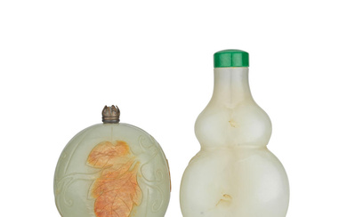 A WHITE JADE SNUFF BOTTLE AND A CELADON JADE BOTTLE...