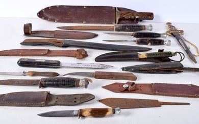 A collection of Vintage knives with wound leather handled grips together with a Bowie Knife , small