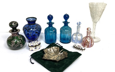 A collection of glass, including a 19th century opaque twist wine glass, with fruit of the vine