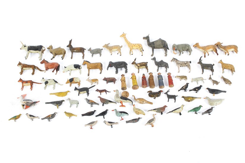 A collection of painted wooden toy figures and animals, early 20th century