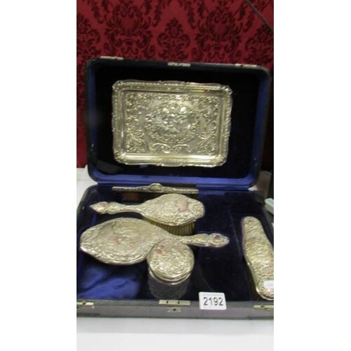 A fine cased hall marked silver dressing table set with soli...