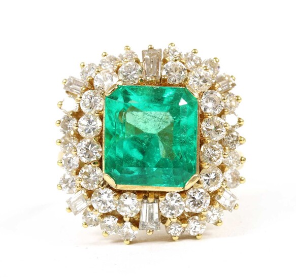 A gold Colombian emerald and diamond cluster ring
