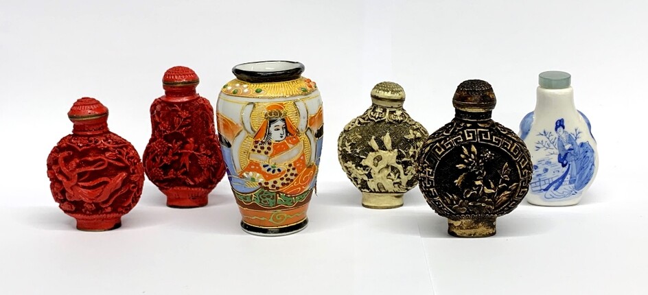 A group of five Chinese snuff bottles and a small satsuma vase.