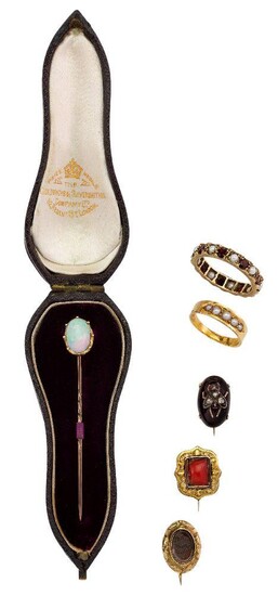 A group of jewellery, comprising: an opal single stone stick pin; a Victorian, cabochon garnet brooch with applied, rose-cut diamond and garnet fly; an early 19th century gold cased and coral Corallium rubrum, brooch; an early 19th century mourning...