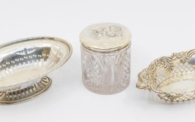 A group of silver to include: Edwardian silver shaped oval...