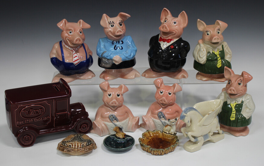 A large mixed group of Wade pottery, including a set of five Wade NatWest pigs, various posy and can