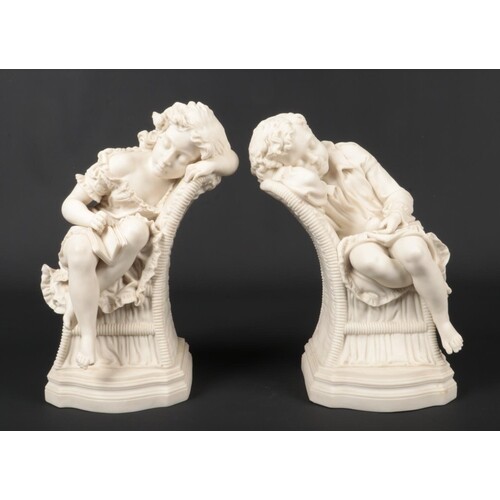 A large pair of Victorian Parian sculptures modelled as chil...