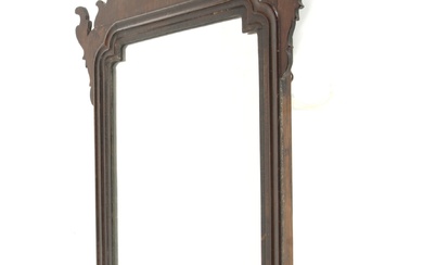 A late 19th to early 20th century mahogany Chippendale style fretwork wall mirror.