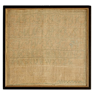 A needlework alphabet sampler "Lucy Enott sampler wrought in...